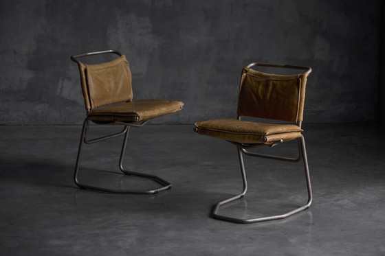 Image 1 of Eetkamerstoel van leer en staal, ontworpen door Raymond Rombouts, België, 20e eeuw.