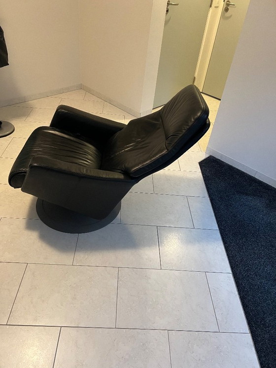 Image 1 of Leather recliner with footrest
