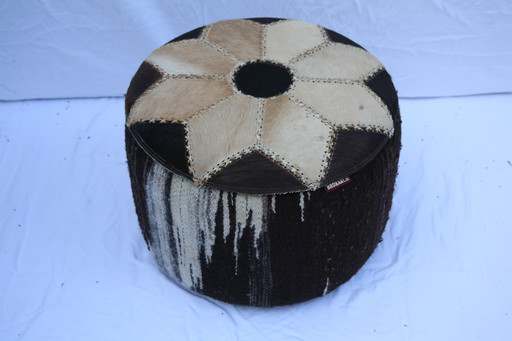 Two vintage (sheep's wool) poufs with storage space