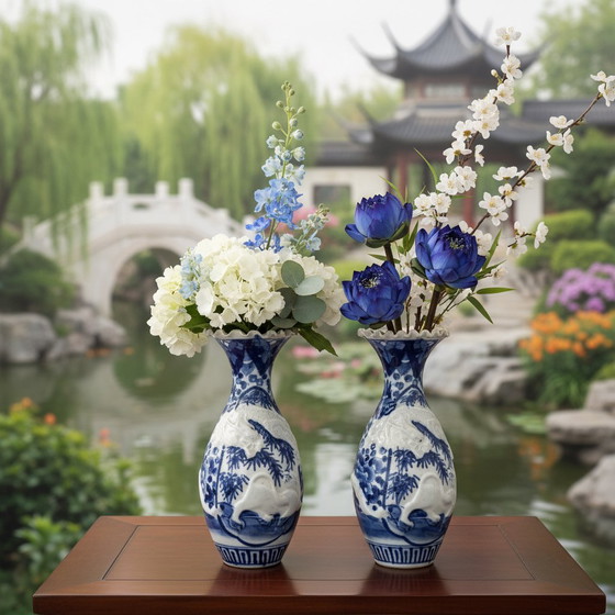 Image 1 of Complete set of 11 antieke Japanse  blauw witte imari vazen , formaten tussen de 12 en 32cm