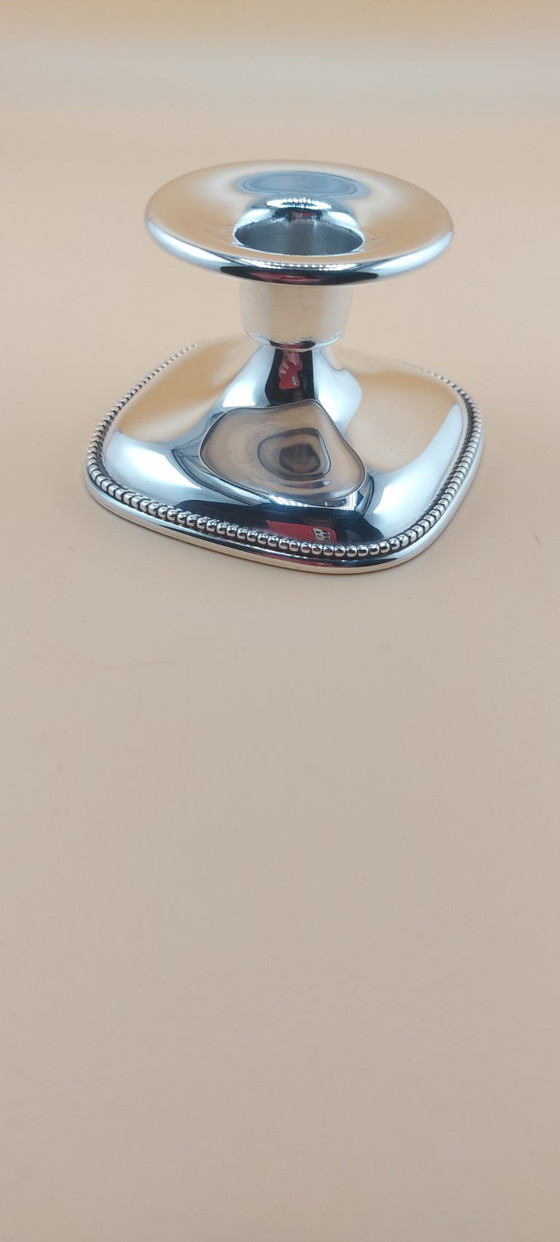 Image 1 of Lot of silver-plated items including candlestick, small bowl, tea strainer