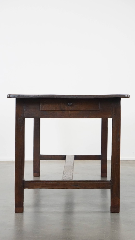 Image 1 of Antique early 19th century French dining table made of oak with 1 drawer