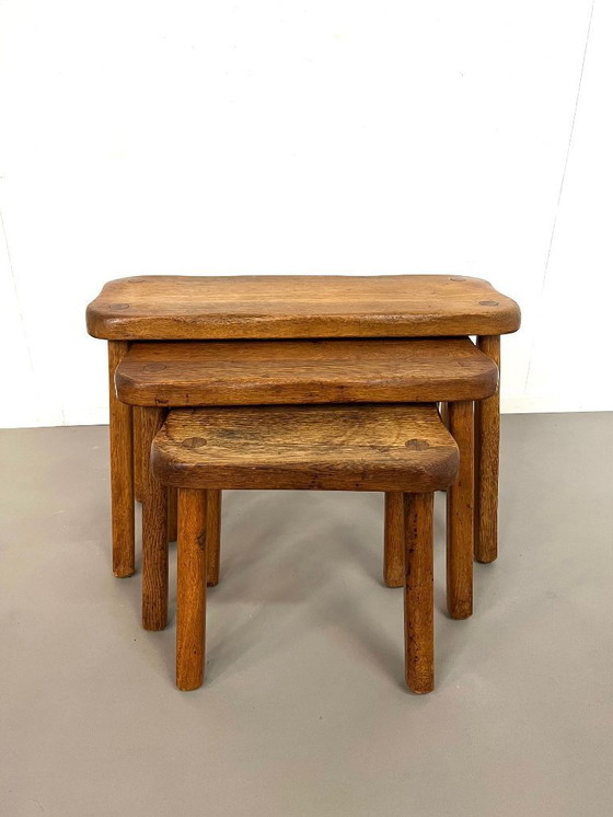 Image 1 of 3 solid Brutalist oak side tables, France, 1960s.