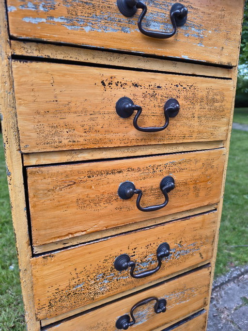 Vintage ochre yellow chest of drawers / apothecary
