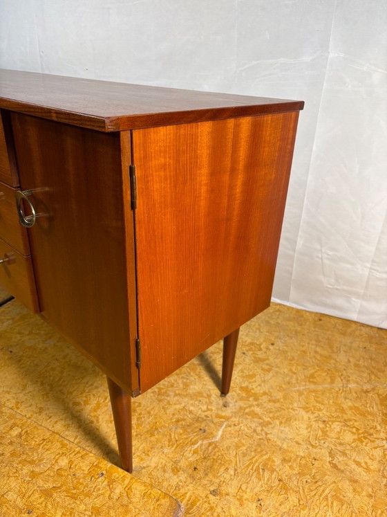 Image 1 of Mid Century Retro Teak Small Sideboard by Schreiber (Circa 1960)  A stylish and compact mid century modern teak sideboard by Sch