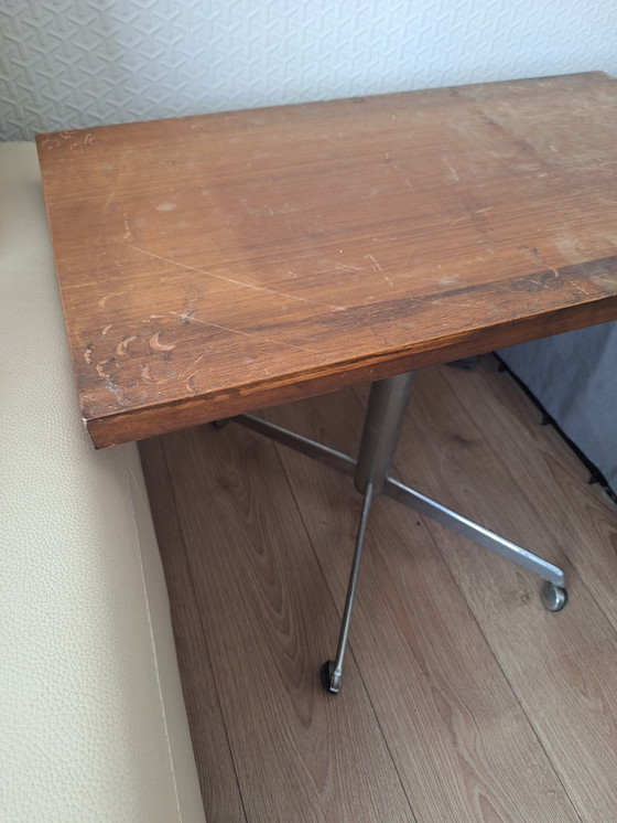 Image 1 of Vintage wooden table on wheels
