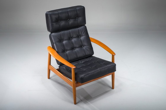 Image 1 of Fauteuil met model FD 164 frame van Arne Vodders en model 118 armleuningen van Grete Jalks in teak en zwart leer, Denemarken, ja