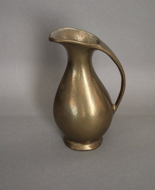 Massive, heavy brass vase in the shape of a jug
