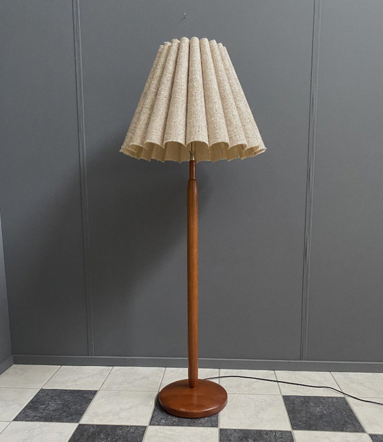 Image 1 of Domus Teakhouten vloerlamp uit 1960, met origineel label! Hoogte: 140 cm - 188 cm