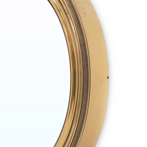Image 1 of Specchio rotondo in ottone montato a parete, anni '50