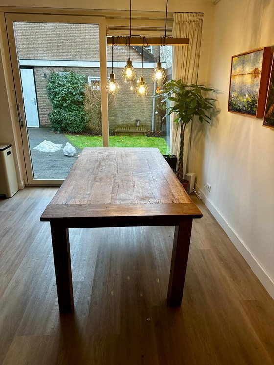 Image 1 of Robust wooden dining table