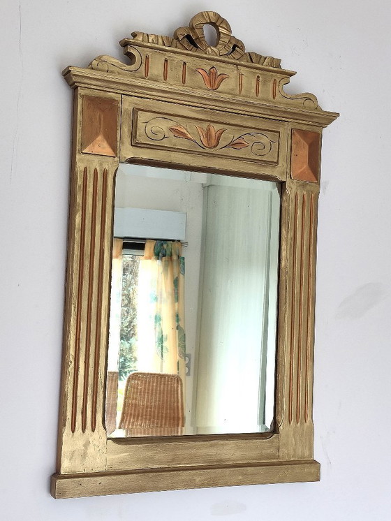 Image 1 of Gilded wooden mirror with carved pediment in the trumeau style