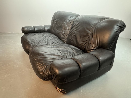 Image 1 of Beautiful Big Black Leather Postmodern Italian Design Space Age 2-Seat Lounge Sofa with Brass Buttons and Playful Cord Lacing.