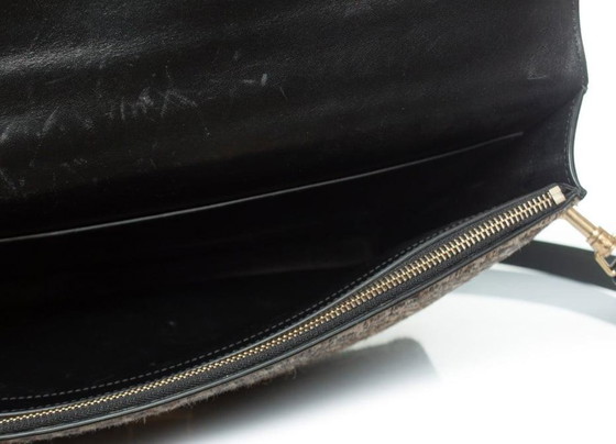 Image 1 of Porte-documents Céline en cuir imprimé léopard noir et marron