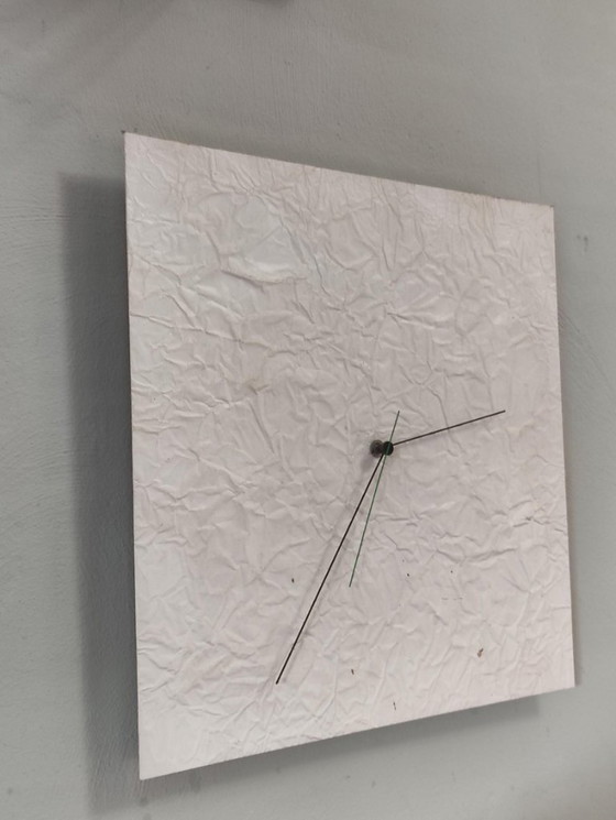 Image 1 of horloge murale froissée