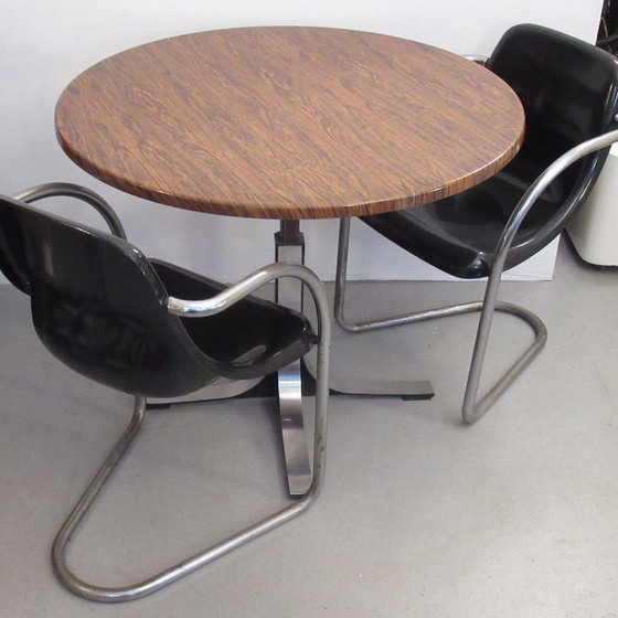 Image 1 of In hoogte verstelbare ronde tafel, jaren 60