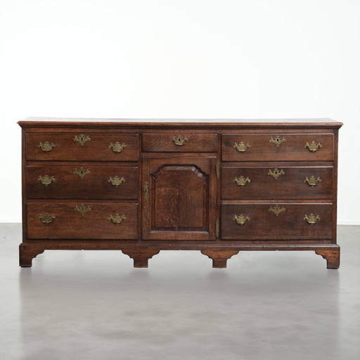 Beautiful, large, and functional 18th-century antique English oak sideboard/English low dresser with its original fittings.