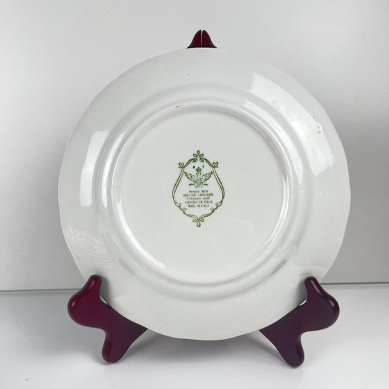 Image 1 of Set van 6 Italiaanse dessertbordjes met een Engels design en een rood patroon.