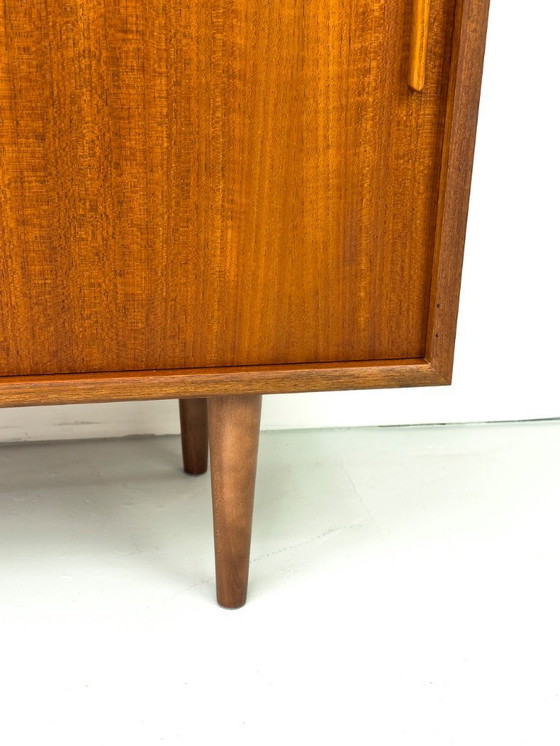 Image 1 of Tablero alto de teca con puerta corredera, años 60