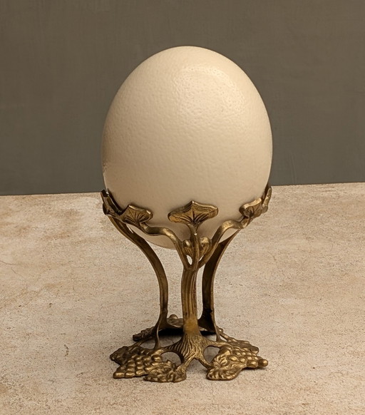 Ostrich egg on Art Nouveau ornament