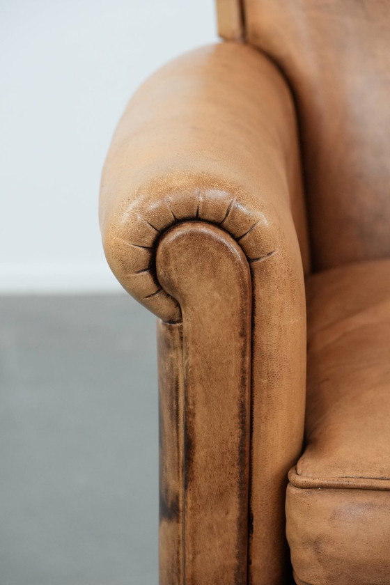 Image 1 of 2 x Subtiele vintage schapenleren fauteuil met een mooie lichte kleur