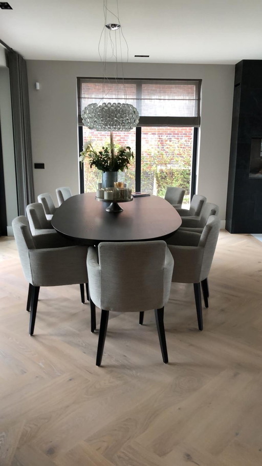 Black solid oak dining table with 10 chairs