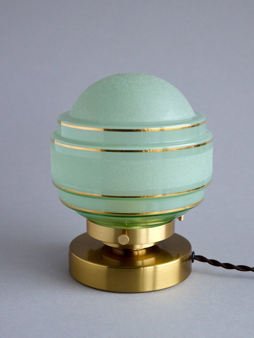 Lampada da tavolo in vetro satinato verde e oro