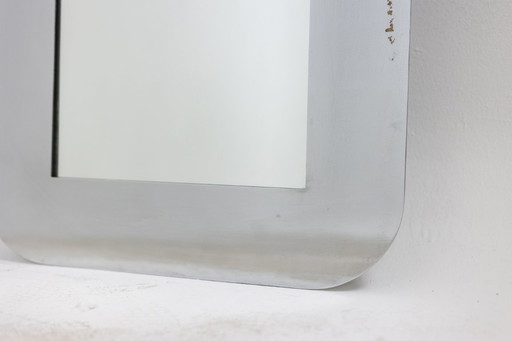 Rectangular mirror, polished metal. Italy, 1970s