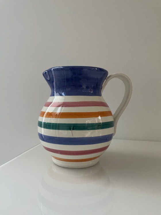 Image 1 of Handgemaakte vintage schenkkan met kleurrijke strepen