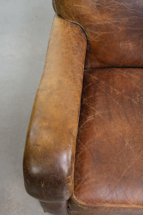 Image 1 of Vintage generfde rundleren fauteuil met ronde vormen