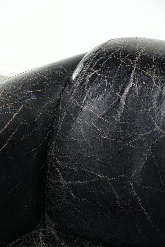 Image 1 of 2x rugged black vintage cowhide Aviator design armchairs with a distinctive look