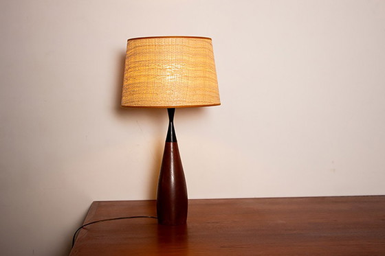 Image 1 of Large Danish keel-shaped table lamp in teak and ebony by Fog & Morup 1960.