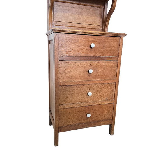 Image 1 of Antique narrow oak chest of drawers, from the early 20th century