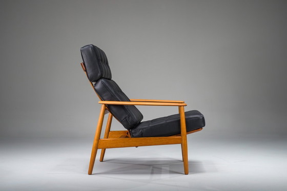 Image 1 of Fauteuil met model FD 164 frame van Arne Vodders en model 118 armleuningen van Grete Jalks in teak en zwart leer, Denemarken, ja