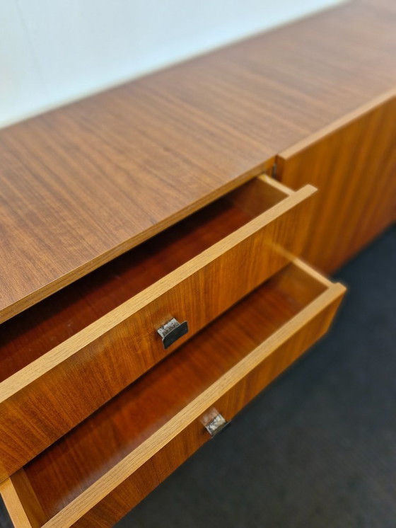 Image 1 of Vintage teak veneer sideboard with wooden legs 70s