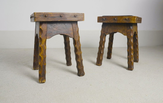 Image 1 of Rustic Oak Stools, 1940s French Hand-Carved Farmhouse Milking Stools, Fireplace Chalet Mountain Decor with Studded Leather Seats