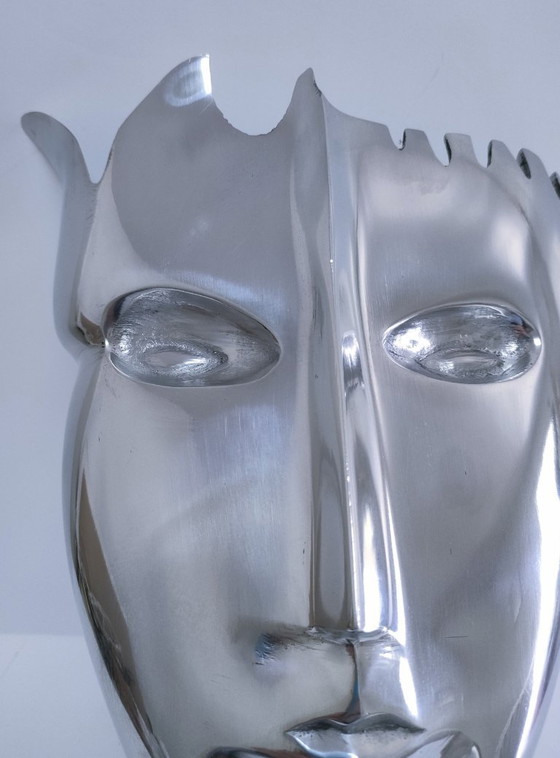 Image 1 of sculpture visage stylisé métal poli