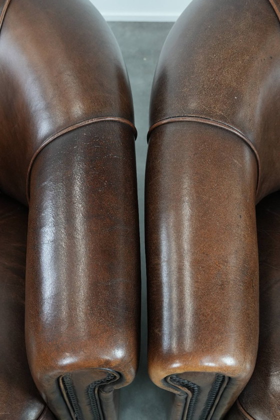 Image 1 of 2 poltrone da club in pelle di pecora con cuscino di seduta fisso e bellissimi colori