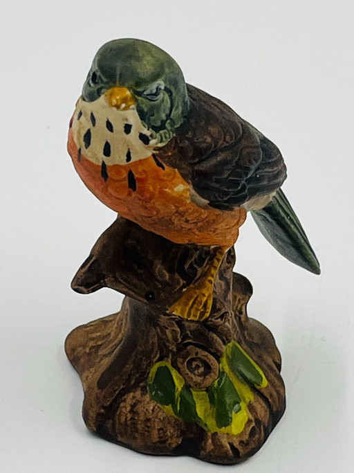 Figurine Merle d'Amérique en porcelaine biscuit