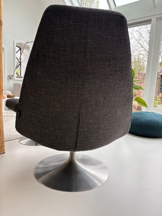 Image 1 of Splendida e raffinata poltrona girevole Kartell con pouf/sgabello.