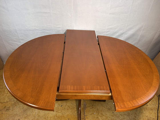 Image 1 of Mid-Century Retro Vintage Teak Extending Round Dining Table by Parker Knoll – 1970  Elegant | Space-Saving | Practical | Iconic 