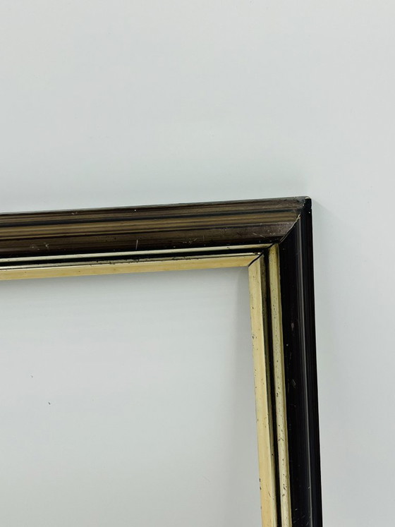 Image 1 of Antiker, dunkelbrauner Rahmen mit doppelter Goldverzierung