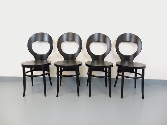 Image 1 of Set van 4 vintage Baumann Mouette stoelen in zwart hout uit de jaren 70.