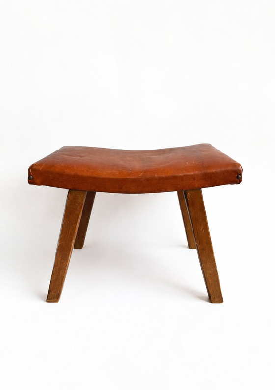 Image 1 of 1960s Mid-Century Brutalist Cognac Leather Saddle Ottoman Tapered Wood Stool