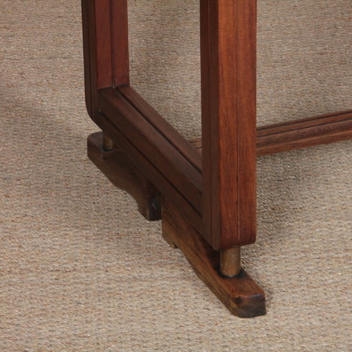 Dining table in wood and brass, French work, 1940