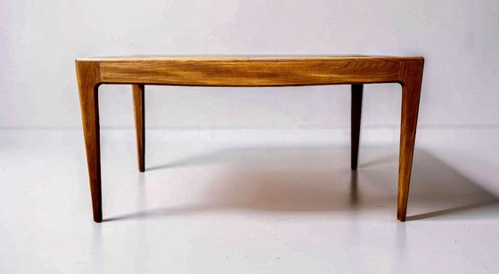 Image 1 of Een uitschuifbare teakhouten eettafel van Fonseca, vervaardigd door Younger Ltd, in mid-century modern stijl.