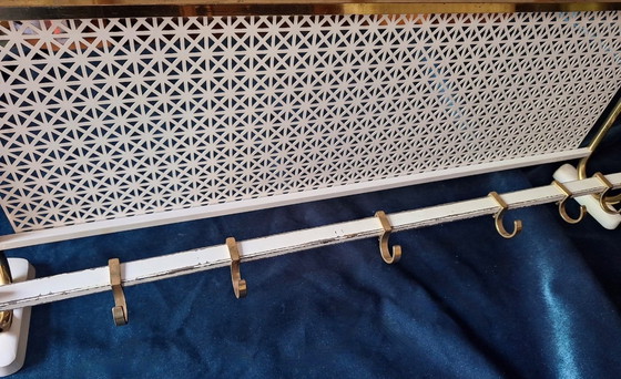 Image 1 of Appendiabiti e cappelliera in ottone e metallo perforato secondo Mategot, anni '60