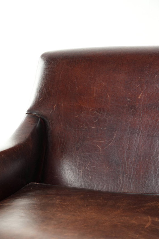Image 1 of Poltrona di design in pelle di pecora in buone condizioni, con un bellissimo colore intenso e una seduta confortevole.