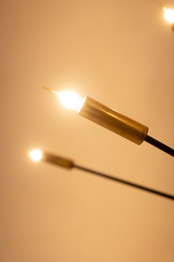 Image 1 of Lampadario a forma di Sputnik in ottone dorato patinato e lacca nera. Contemporaneo.