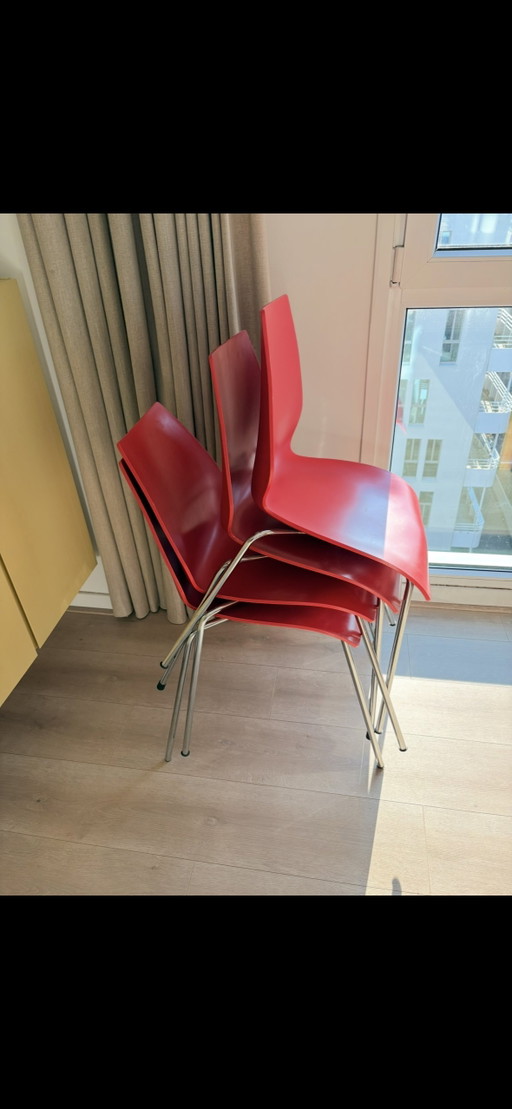 Kartell Maui red dining chairs